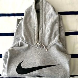 A heavy Nike Hoodie,Gray in Color…Perfect for late Winter and early Spring days